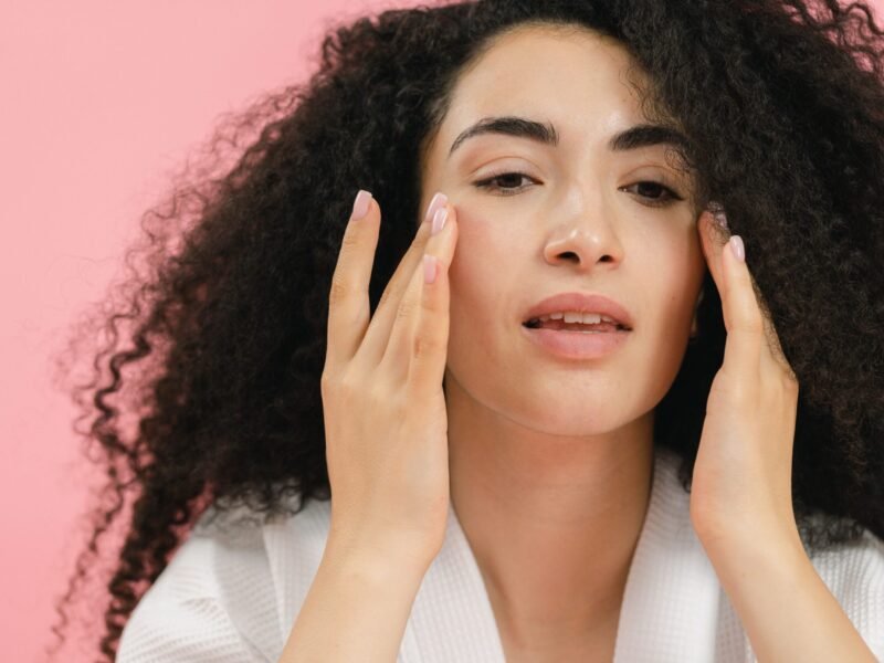 Picture of a lady doing her skin care routine